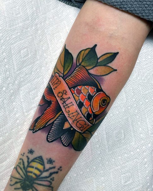 Distinctive Female Goldfish Tattoo Designs