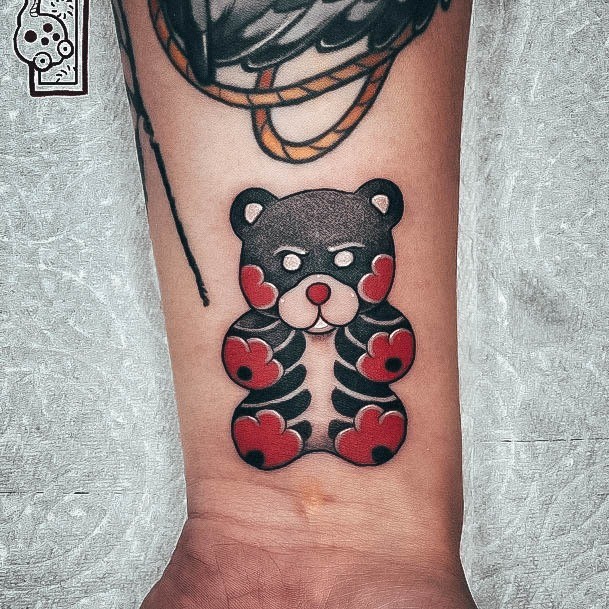 Distinctive Female Gummy Bear Tattoo Designs Black And Red Ink Wrist