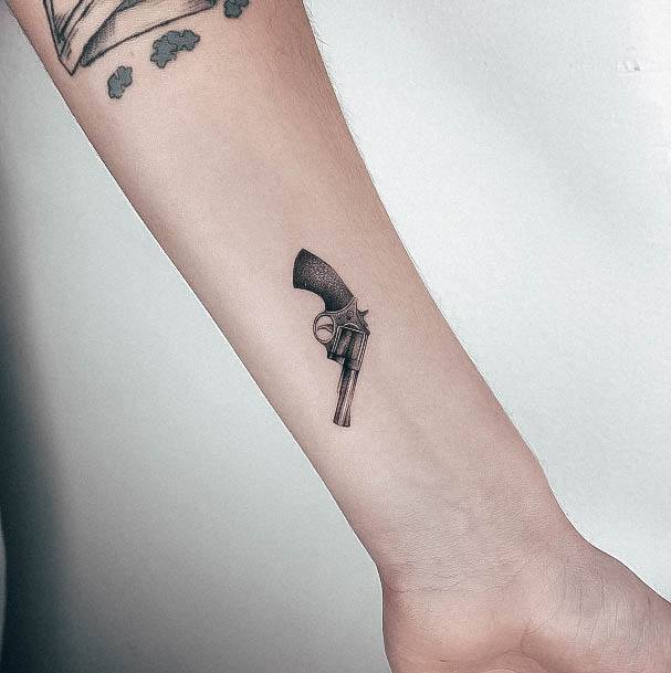 Distinctive Female Gun Tattoo Designs Tiny Forearm