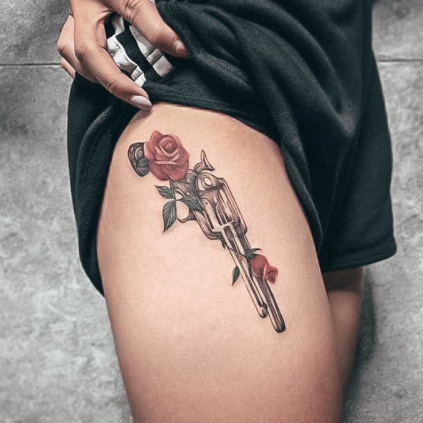 Distinctive Female Gun Tattoo Designs