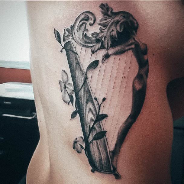 Distinctive Female Harp Tattoo Designs