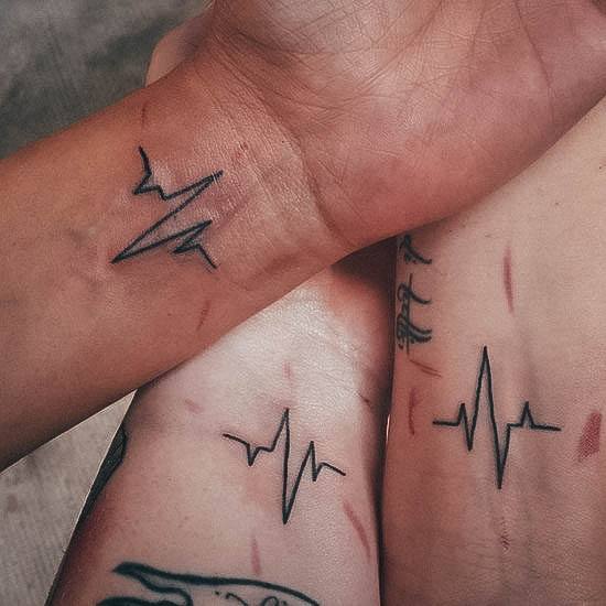 Distinctive Female Heartbeat Tattoo Designs