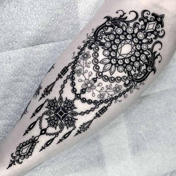 Distinctive Female Jewelry Tattoo Designs