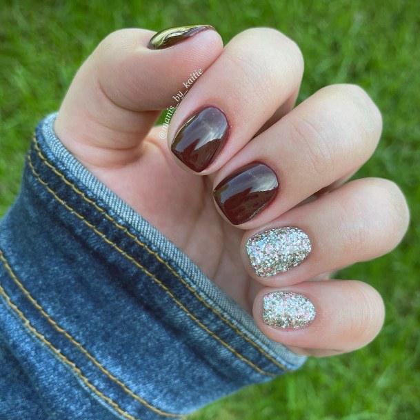 Distinctive Female Maroon And Silver Nail Designs