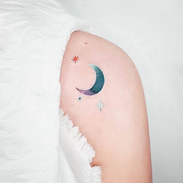 Distinctive Female Moon And Stars Tattoo Designs