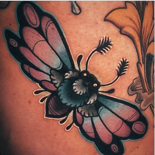 Distinctive Female Moth Tattoo Designs