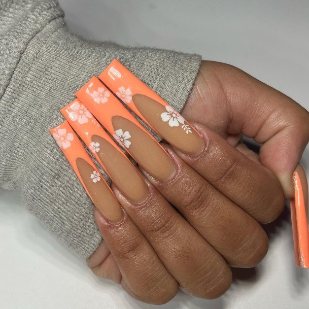 Distinctive Female Orange And White Nail Designs