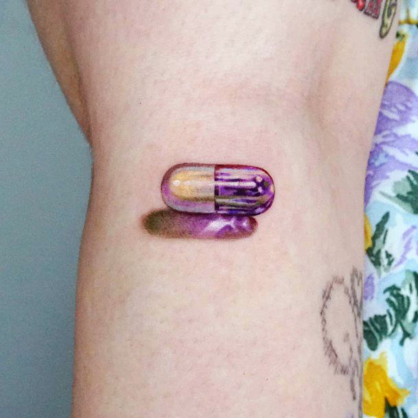 Distinctive Female Pill Tattoo Designs