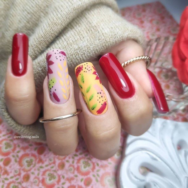 Distinctive Female Red And Yellow Nail Designs