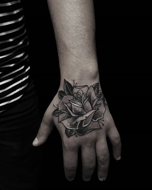 Distinctive Female Rose Hand Tattoo Designs