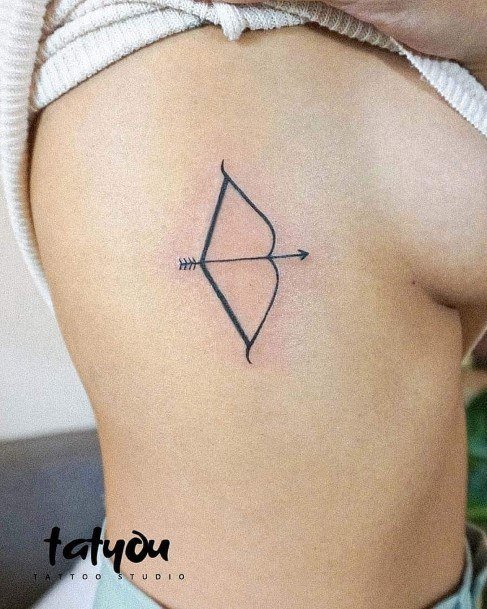 Distinctive Female Sagittarius Tattoo Designs Rib Cage Side