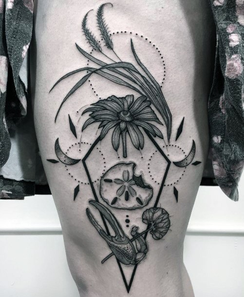 Distinctive Female Sand Dollar Tattoo Designs