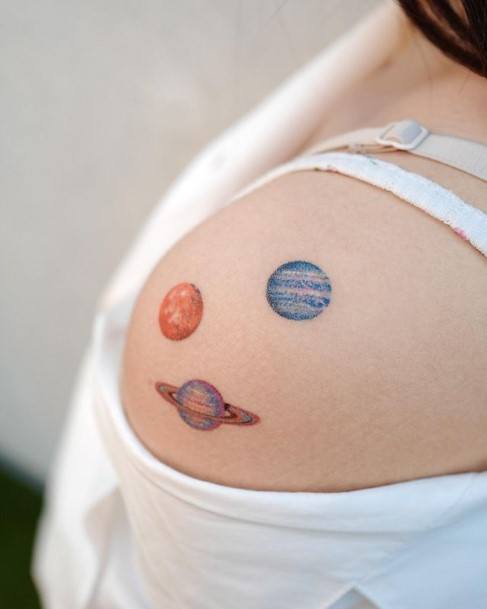 Distinctive Female Saturn Tattoo Designs