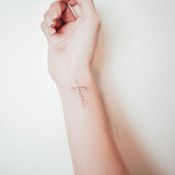 Distinctive Female Small Cross Tattoo Designs