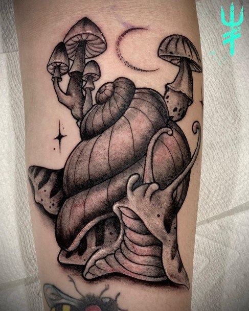 Distinctive Female Snail Tattoo Designs