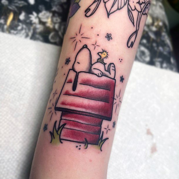 Distinctive Female Snoopy Tattoo Designs