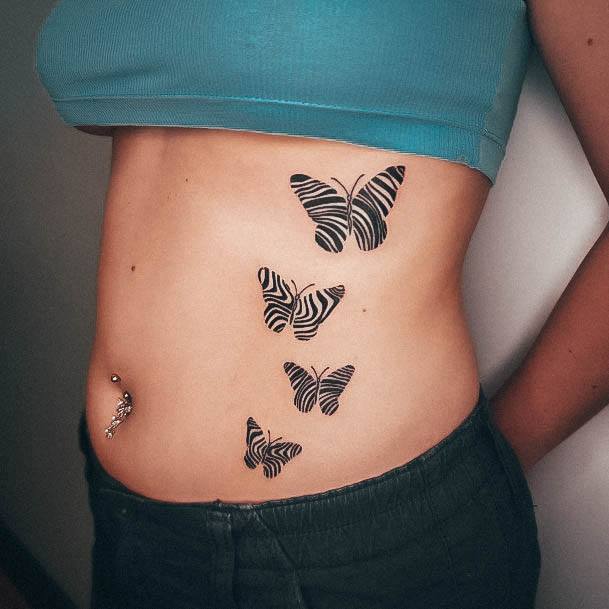 Distinctive Female Stomach Tattoo Designs