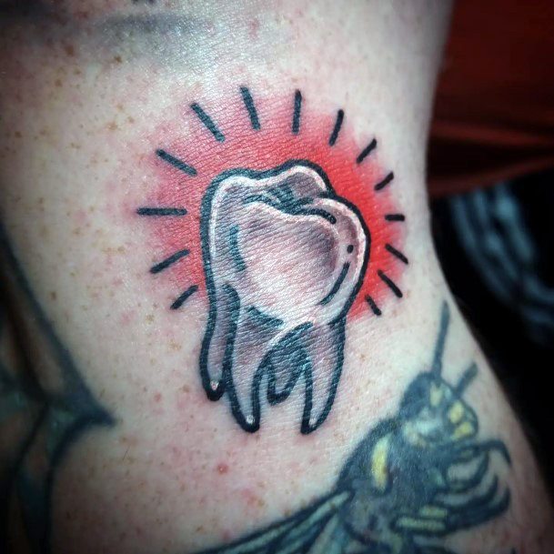 Distinctive Female Tooth Tattoo Designs