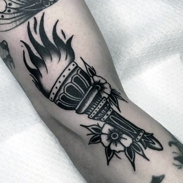 Distinctive Female Torch Tattoo Designs