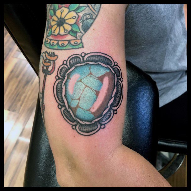 Distinctive Female Turquoise Tattoo Designs