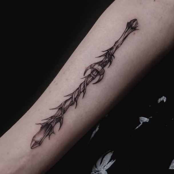 Distinctive Female Wand Tattoo Designs