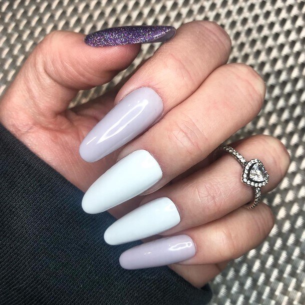 Distinctive Female White And Purple Nail Designs