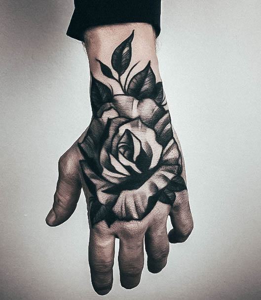 Divine Females Rose Hand Tattoo Heavily Shaded Black And Grey