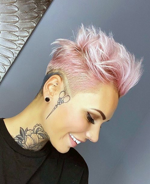 Edgy Hairstyle On Female Bubblegum Pink Color Razor Sides And Back