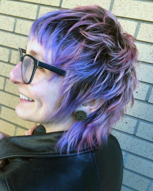 Edgy Hairstyle On Girl With Pink And Purple Color And Razor Edge Shag