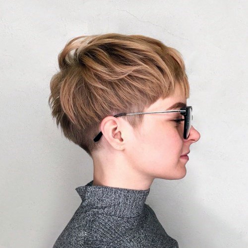 Edgy Razor Back Pixie Hairstyle With On Female Golden Honey Color