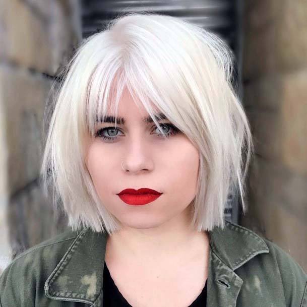 Edgy Textured And Layered Bright Platinum Blonde Blunt Womens Hairstyle