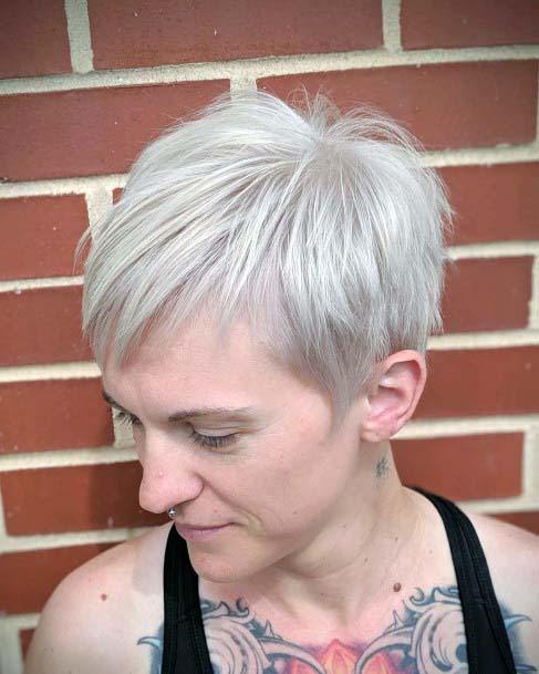 Edgy Textured And Layered Platinum Blonde Pixie Cut Womens Hairstyle