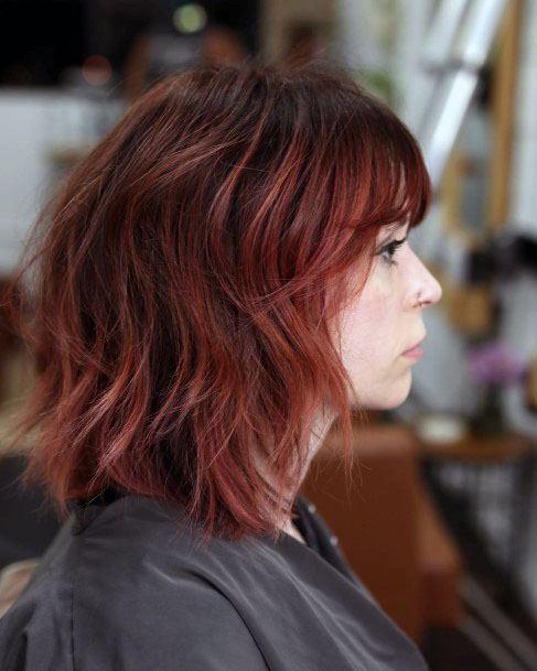 Edgy Textured Black And Red Highlighted Shoulder Length Womens Hairstyle