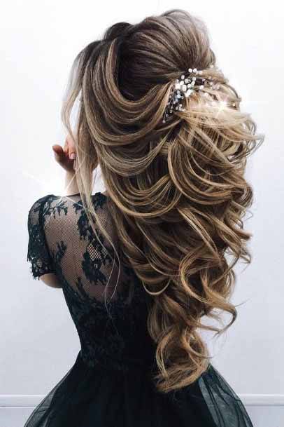 Elaborate Hairstyle For Women Cascading Blonde Curls