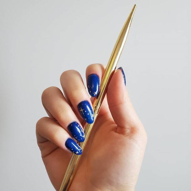 Elaborate Styles For Womens Blue And Gold Nail