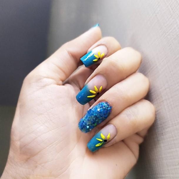 Elaborate Styles For Womens Blue And Yellow Nail