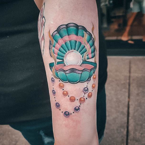 Elaborate Styles For Womens Clam Tattoo