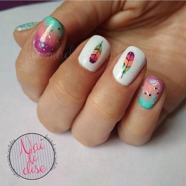 Elaborate Styles For Womens Feather Nail