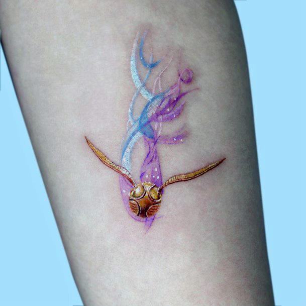 Elaborate Styles For Womens Golden Snitch Tattoo