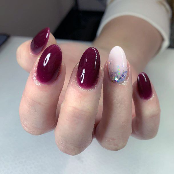 Elaborate Styles For Womens Maroon And Silver Nail