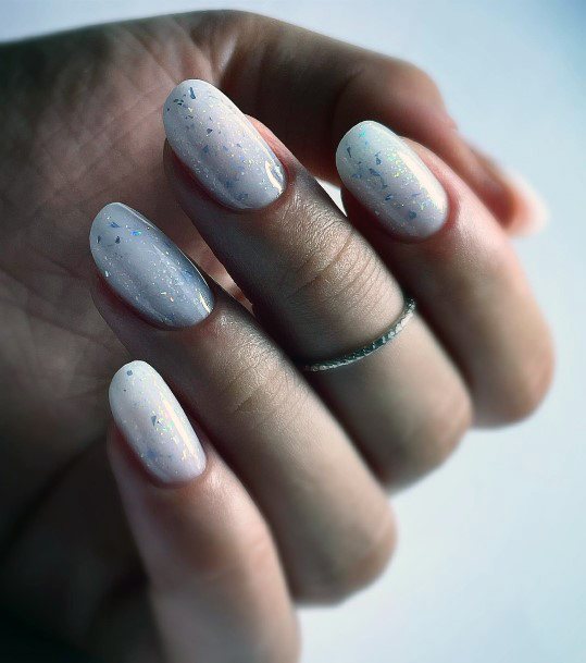 Elaborate Styles For Womens Milky White Nail