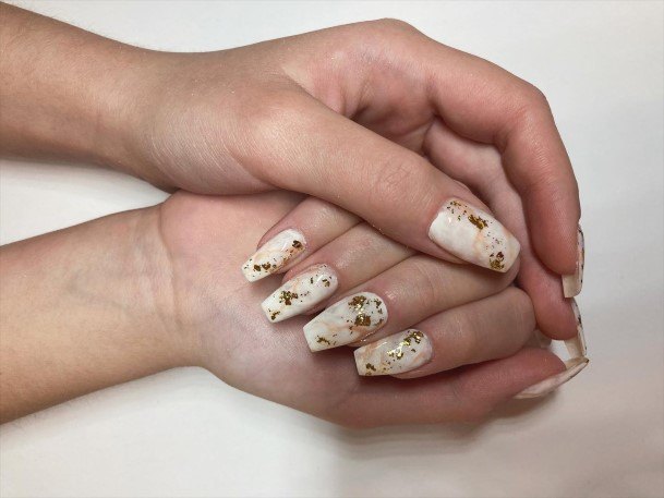 Elaborate Styles For Womens Nude Marble Nail