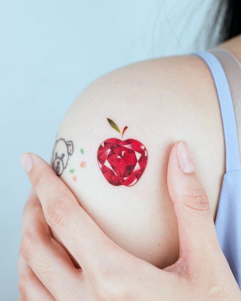 Elaborate Styles For Womens Ruby Tattoo