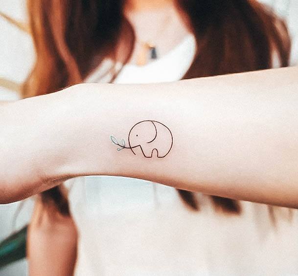 Elaborate Styles For Womens Small Elephant Tattoo