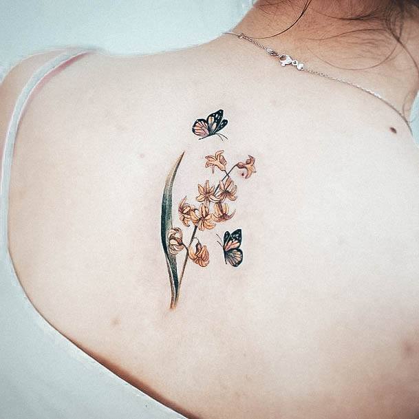 Elaborate Styles For Womens Small Flower Tattoo