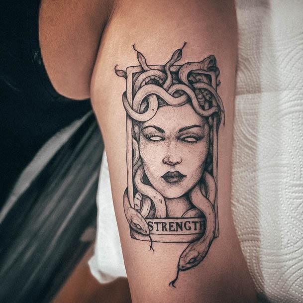 Elaborate Styles For Womens Strength Tattoo