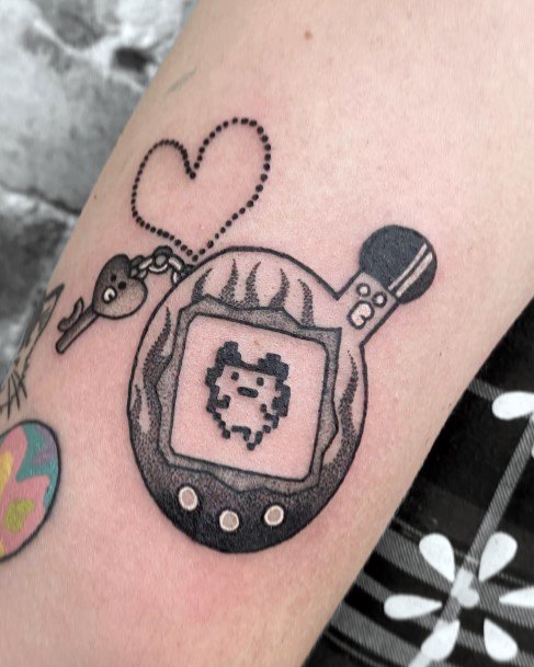 Elaborate Styles For Womens Tamagotchi Tattoo