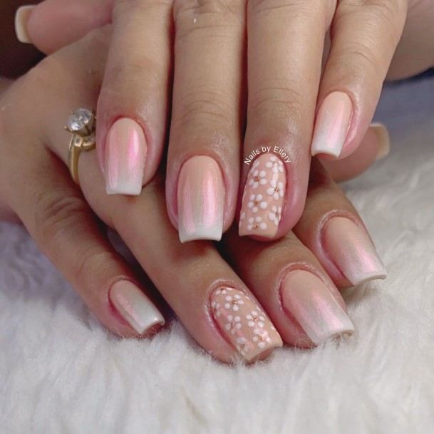 Elaborate Styles For Womens White And Nude Nail