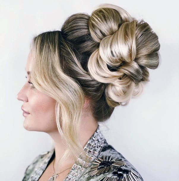 Elaborate Updo With Weaved Large Bun And Waved Front