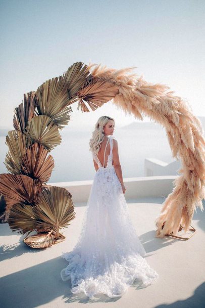 Elegant Golden Dried Pampas Grass And Palm Leaves Wedding Arch Ideas